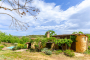 A rustic traditional stone cottage (from parking area) 